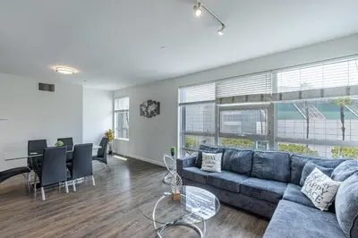 a living room with a couch and a table at 2 Bed 2 Bath X street LA Live, Convention Center, Microsoft Theater in Los Angeles