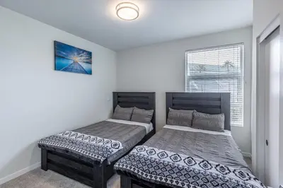 two beds sitting next to each other in a bedroom at 2 Bed 2 Bath X street LA Live, Convention Center, Microsoft Theater in Los Angeles