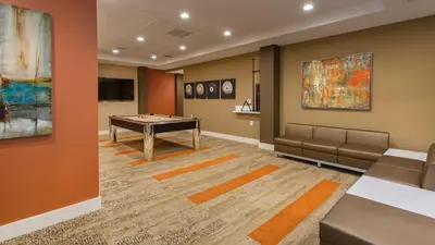a game room with a pool table and couch at LALA House -1Br with Free Parking, Pool, Laundry in Los Angeles