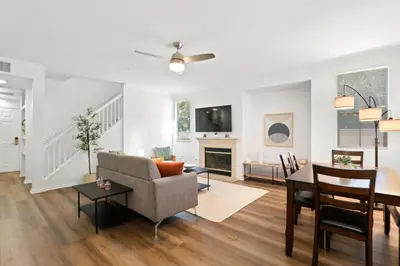 a living room with a couch and a table at 4bd Townhouse - Special Limited Time Offer near Venice Beach! in Los Angeles