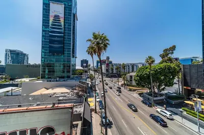 a view of a city street with cars on the road at Sunset Blvd Studio Apt in the Heart of Hollywood in Los Angeles