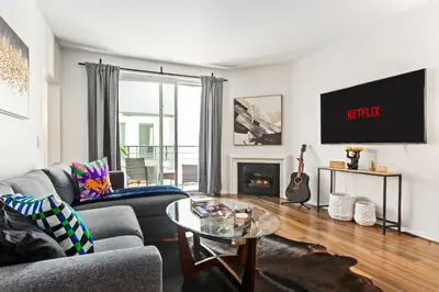 a living room with a couch and a table at Cozy Oasis in Marina Del Rey!Free Swimming Pool and Parking in Los Angeles