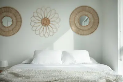 a bedroom with two mirrors on the wall and a bed at Beautiful 1BR Apt in Hollywood w Pool and Parking in Los Angeles
