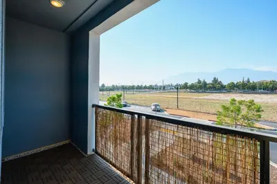 a balcony with a view of a field at Luxurious Ontario Townhouse Ideal Family in Ontario