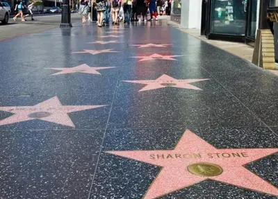 a row of stars on a sidewalk on a street at Hollywood Townhome, Resort Amenities, 2 Free Parking Spaces! in Los Angeles