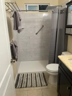 a bathroom with a shower and a toilet at 1 bd guest house in LA perfect for long term stay in Los Angeles