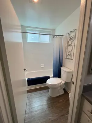 a bathroom with a toilet and a bath tub at Exceptional 2 BR in Heart of Hollywood 201 in Los Angeles