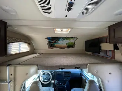 a view of the inside of an rv with a tv at AJ-XL RV Rental in Reseda