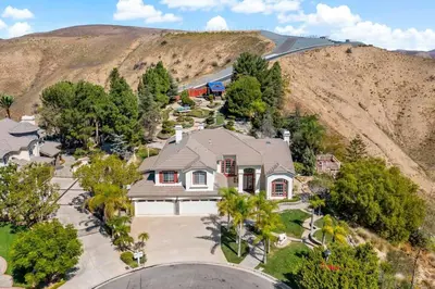 an aerial view of a house with a mountain at Japanese Garden Yorba Linda Hills Luxury Home in Yorba Linda