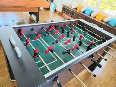 a table with a bunch of baseball bats on it at Luxury Hill Villa with Spectacular View in Anaheim