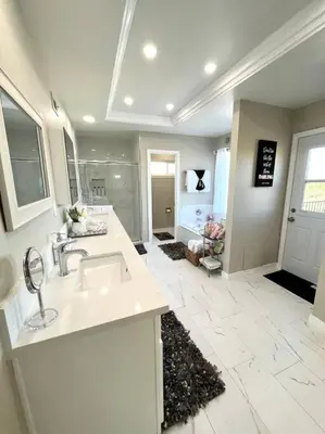 a large bathroom with a sink and a shower at Top of the World Anaheim View Home in Anaheim