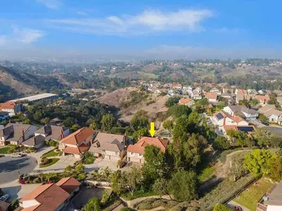 an aerial view of a residential suburb with houses at Secluded Romantic Getaway Home in Anaheim
