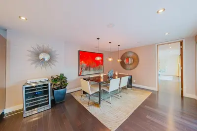 a dining room with a table and chairs and a dining room at Casa Azul in Los Angeles