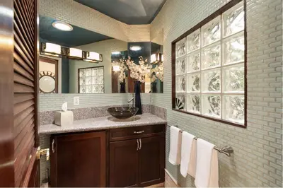 a bathroom with a sink and a mirror at Skyhill Oasis New Lux Designer Modern in Los Angeles