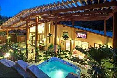 a house with a swimming pool in the yard at Skyhill Oasis New Lux Designer Modern in Los Angeles