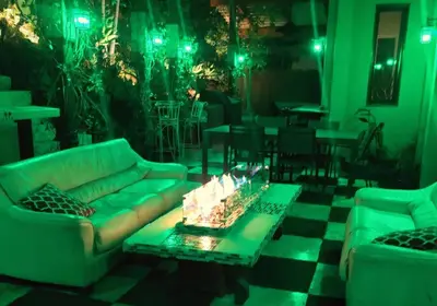 a living room with a couch and a table at Skyhill Oasis New Lux Designer Modern in Los Angeles