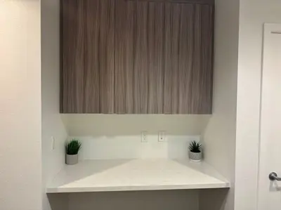 a bathroom with a counter with two potted plants on it at Stylish and Elegant apartment in Glendale