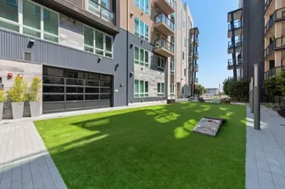 a lawn in the middle of a building at Stylish and Elegant apartment in Glendale