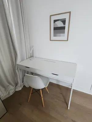 a white desk with a white chair and a picture at Ladera Retreat near Sofi Stadium, LAX, Beach in Los Angeles