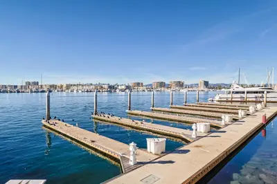 a dock with a boat in the water at Gorgeous 1 Bedroom Apartment#7 in Los Angeles