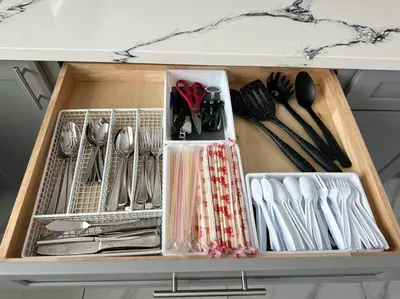 a drawer filled with utensils in a kitchen at New Renovated House in Little Saigon in Midway City