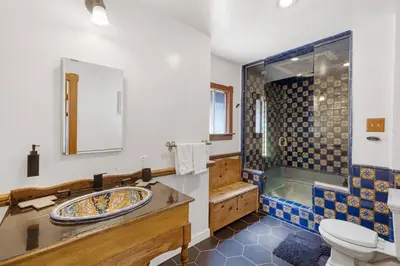 a bathroom with a sink and a shower and a toilet at Hollywood Hills Walk to Universal City Views in Los Angeles