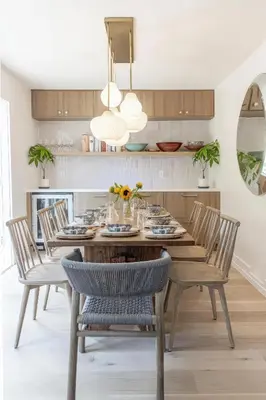 a dining room with a wooden table and chairs at Walk to Venice Beach from Luxury home in Los Angeles