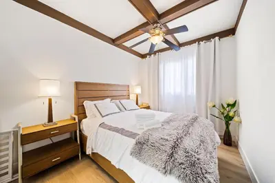a bedroom with a bed and a ceiling fan at 2Bedroom home for your comfort and relaxation in Alhambra