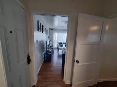 a hallway with a door leading to a dining room at Hollywood - Budget Private Quiet 2nd Flr 1BR and 1BA in Los Angeles