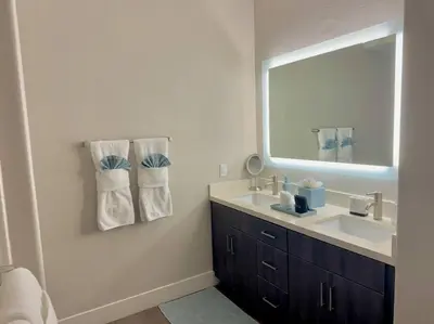 a bathroom with a sink and a mirror at Cozy Resort-Style Experience - Garden View in Los Angeles