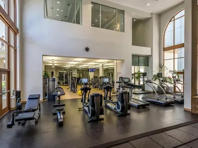 a gym with treadmills and cardio equipment in a building at Cozy Resort-Style Experience - Garden View in Los Angeles