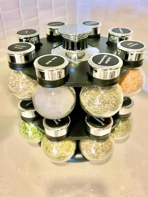 a display of different types of food in glass jars at Penthouse One Bedroom Garden View Condo by UCLA in Los Angeles