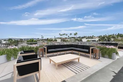 a patio with two couches and a coffee table at Designer Silver Lake Stylish One Bedroom with Parking in Los Angeles