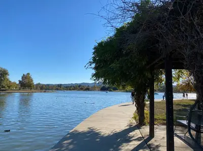 a park path next to a body of water at Lovely one bedroom guest house in Encino village in Los Angeles
