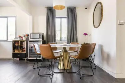 a dining room with a table and chairs at Party House Heaven in North Hollywood