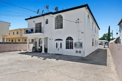 a white building with a lot of windows at Lovely gated 3bedroom & 2 bath unit near Universal studio and Hollywood in North Hollywood