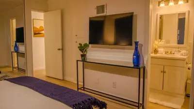 a bedroom with a tub and a sink in a room at Oceanfront 2BR 2BA with Stunning View 333 in Redondo Beach