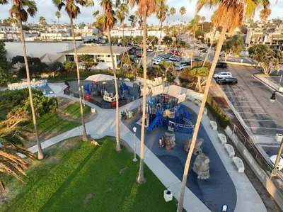 an aerial view of a playground with palm trees at Oceanfront 2BR 2BA with Stunning View 333 in Redondo Beach