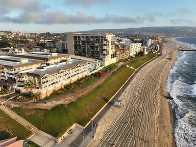 an aerial view of a beach with buildings and the ocean at Oceanfront 2BR 2BA with Stunning View 333 in Redondo Beach