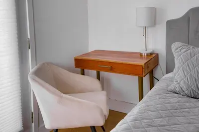a bedroom with a desk and a chair next to a bed at Cozy Private Studio in Granada Hills Near CSUN, Universal in Mission Hills