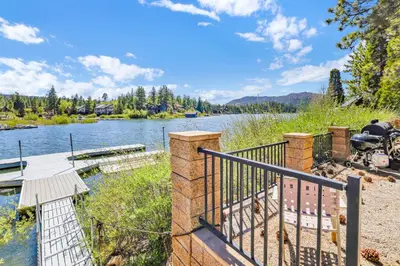 a view of a river with a dock at Breezy estate #114 in Big Bear Lake