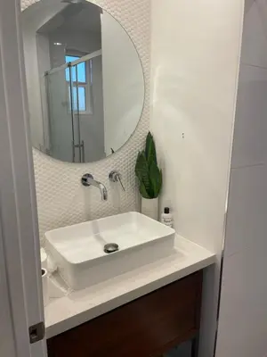 a bathroom with a white sink and a mirror at Inglewood Forum and Sofi park and walk private room in Inglewood