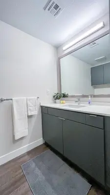 a bathroom with a sink and a mirror at Stunning Hollywood Sign View in Los Angeles