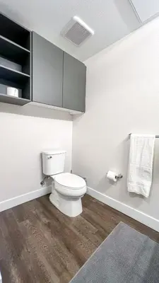 a bathroom with a white toilet in a room at Stunning Hollywood Sign View in Los Angeles