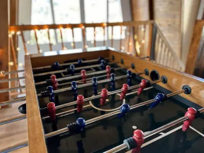 a close up of a pool table with balls at Quiet Mountain Cabin in Lake Arrowhead