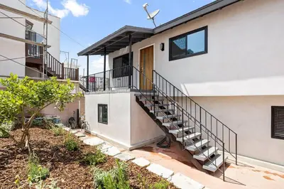 a staircase leading up to a house at Cozy House Minutes From Downtown in Los Angeles