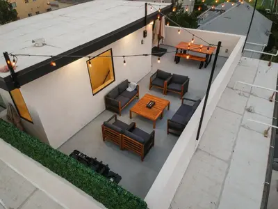 an overhead view of a patio with chairs and a table at Stylish DTLA Home With Views in Los Angeles