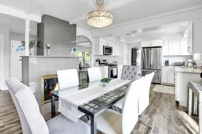 a kitchen and dining room with a table and chairs at Valley Ranch With Pool in Los Angeles