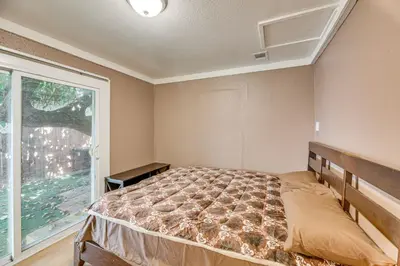 a bedroom with a bed and a window at Walk to Dtwn Shops! Extended Stay Home in Burbank in Burbank