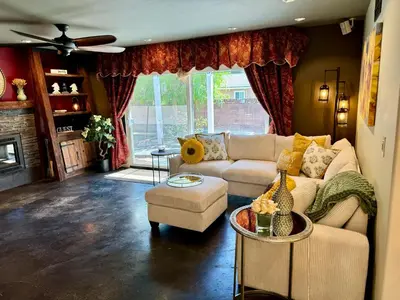 a living room with a couch and a table at Emeric Ave in Simi Valley in Simi Valley